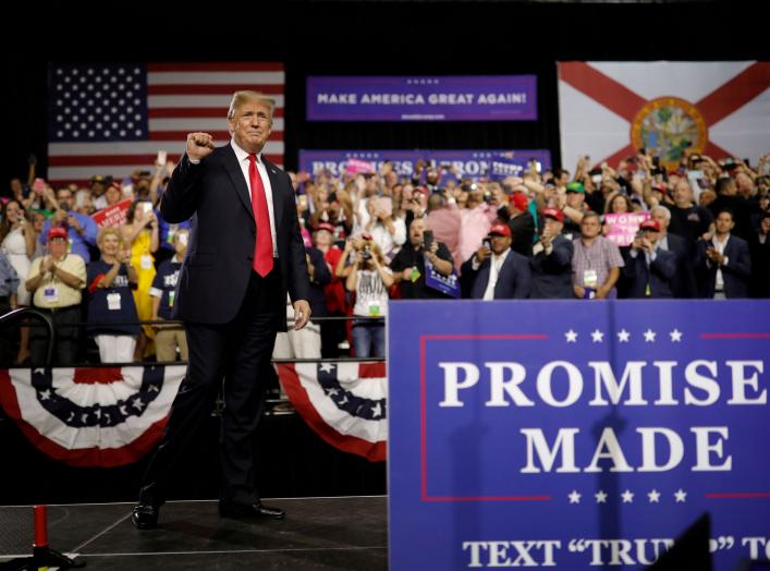 U.S. President Donald Trump acknowledges the crowd during the Make America Great Again rally at the Florida State Fairgrounds in Tampa, Florida, U.S., July 31, 2018. REUTERS/Carlos Barria TPX IMAGES OF THE DAY