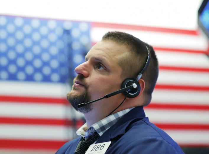 A Trader works on the floor of the New York Stock Exchange (NYSE) in New York, U.S., October 19, 2018. REUTERS/Brendan McDermid