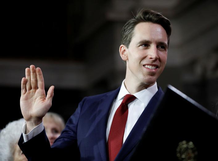 Sen. Josh Hawley (R-MO) participates in a mock swearing in with U.S. Vice President Mike Pence during the opening day of the 116th Congress on Capitol Hill in Washington, U.S. January 3, 2019. REUTERS/Aaron P. Bernstein