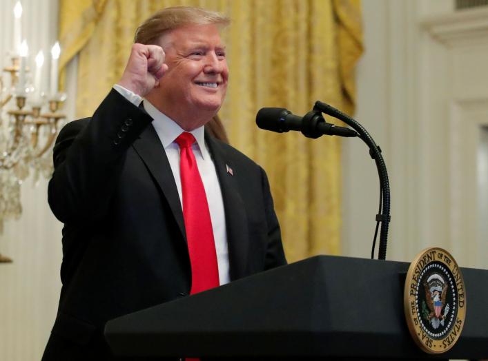 U.S. President Donald Trump reacts as he hosts a reception in honor of National African American History Month at the White House in Washington, U.S., February 21, 2019. REUTERS/Jim Young