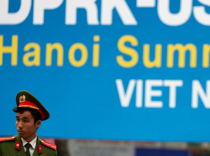 A Vietnamese police officer stands guard at the North Korea-USA summit's media centre in Hanoi, Vietnam, February 23, 2019 REUTERS/Athit Perawongmetha