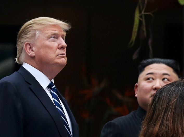 North Korea's leader Kim Jong Un looks towards U.S. President Donald Trump at the Metropole hotel during the second North Korea-U.S. summit in Hanoi, Vietnam February 28, 2019. REUTERS/Leah Millis