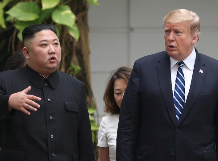 North Korea's leader Kim Jong Un and U.S. President Donald Trump talk in the garden of the Metropole hotel during the second North Korea-U.S. summit in Hanoi, Vietnam February 28, 2019. REUTERS/Leah Millis