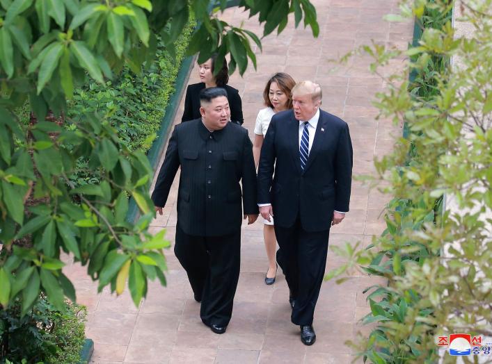 North Korea's leader Kim Jong Un walks with U.S. President Donald Trump during the second North Korea-U.S. summit in Hanoi, Vietnam, in this photo released on March 1, 2019 by North Korea's Korean Central News Agency (KCNA). KCNA via REUTERS ATTENTION EDI