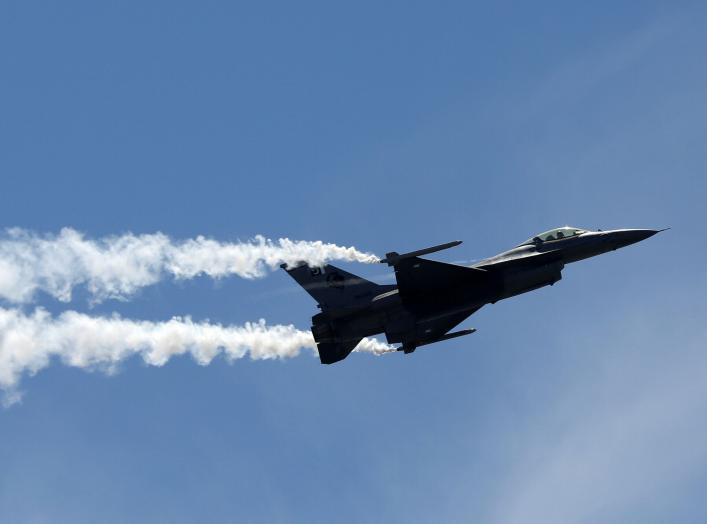 FILE PHOTO: Pakistan Air Force (PAF) Sherdils (Lion Heart) squad's fighter jet F-16 flies during Pakistan Day celebrations, Clifton beach, Karachi, Pakistan, March 23, 2017. REUTERS/Akhtar Soomro/File Photo