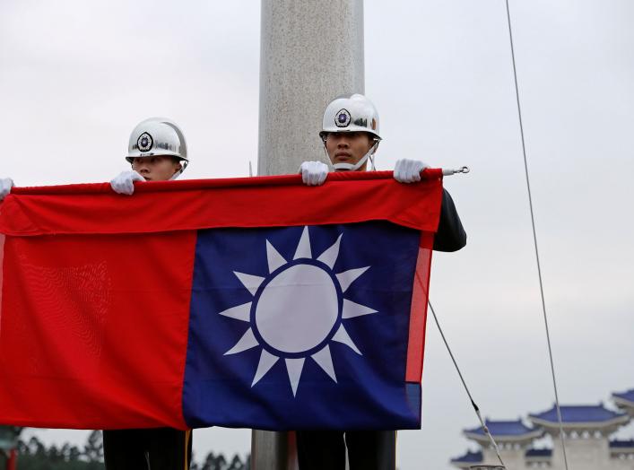 Military honour guards attend a flag-lowering ceremony at Chiang Kai-shek Memorial Hall in Taipei, Taiwan January 22, 2019. Picture taken January 22, 2019. REUTERS/Tyrone Siu