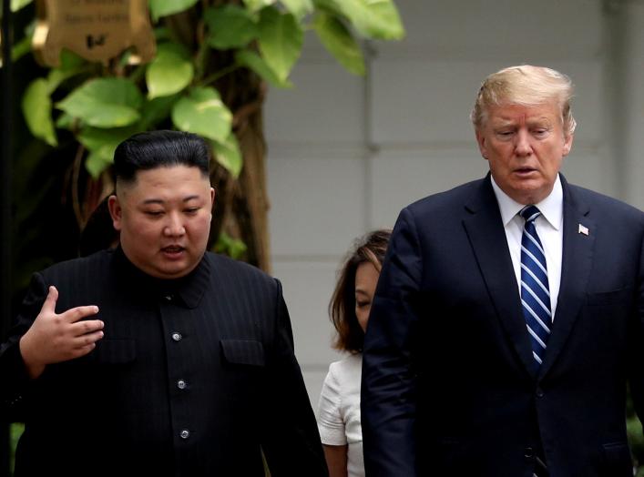 FILE PHOTO: North Korea's leader Kim Jong Un and U.S. President Donald Trump talk in the garden of the Metropole hotel during the second North Korea-U.S. summit in Hanoi, Vietnam February 28, 2019. REUTERS/Leah Millis/File Photo