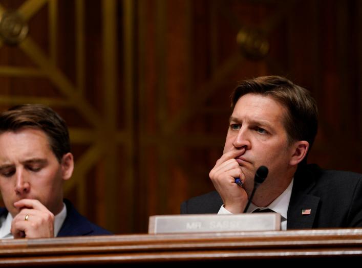 Sen. Ben Sasse (R-NE), at right, and Sen. Josh Hawley (R-M0), look on as U.S. Attorney General William Barr testifies before a Senate Judiciary Committee hearing entitled "The Justice Department's Investigation of Russian Interference