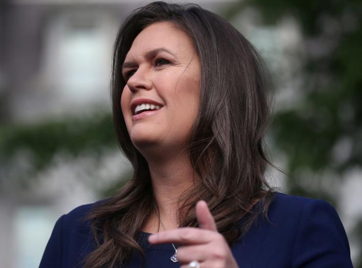 U.S. White House Press Secretary Sarah Huckabee Sanders speaks to the news media after giving an interview to Fox News outside of the White House in Washington, U.S. May 22, 2019. REUTERS/Leah Millis