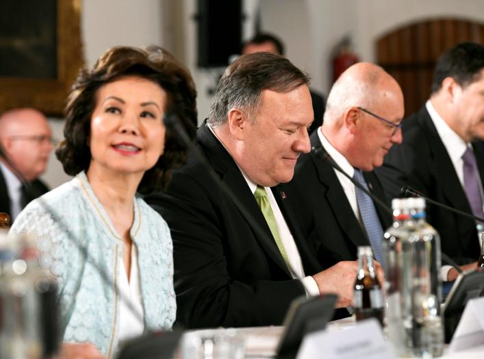 U.S. Secretary of State Mike Pompeo looks on next to U.S. Secretary of Transportation Elaine Chao during a CEO meeting in The Hague, Netherlands June 3, 2019. REUTERS/Piroschka Van De Wouw