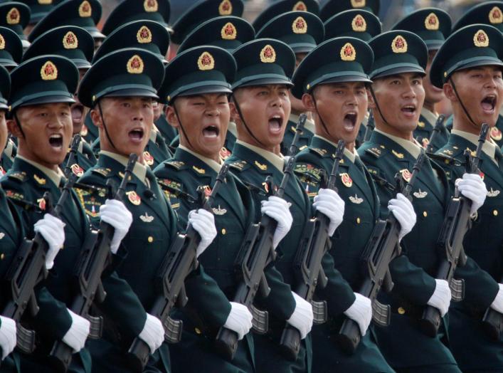 Soldiers of People's Liberation Army (PLA) march in formation past Tiananmen Square during the military parade marking the 70th founding anniversary of People's Republic of China, on its National Day in Beijing, China October 1, 2019. REUTERS/Jason Lee