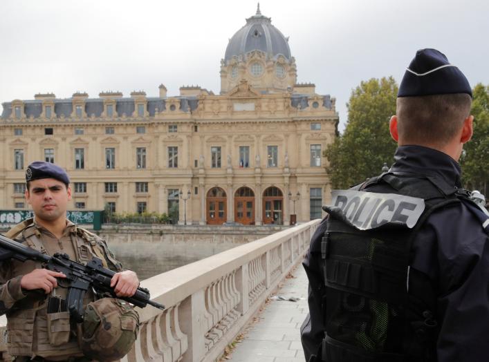 French police secure the area in front of the Paris Police headquarters in Paris, France, October 3, 2019. REUTERS/Philippe Wojazer