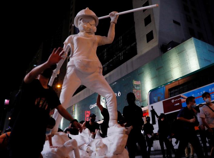 A 4m tall ‘Statue of Lady Liberty Hong Kong’ is seen during a demonstration after a government’s ban on face masks under emergency law, at Mong Kok, in Hong Kong, China, October 4, 2019. REUTERS/Tyrone Siu