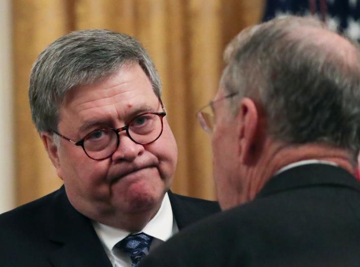 U.S. Attorney General William Barr speaks with Senator Chuck Grassley (R-IA) at an event hosted by U.S. President Donald Trump to celebrate federal judicial confirmations in the East Room of the White House in Washington, U.S., November 6, 2019.