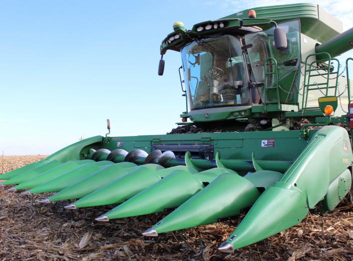 A farmer's corn harvesting combine is seen during the corn harvest as farmers struggle with the effects of weather and ongoing tariffs resulting from the trade war between the United States and China that are effecting their agricultural business