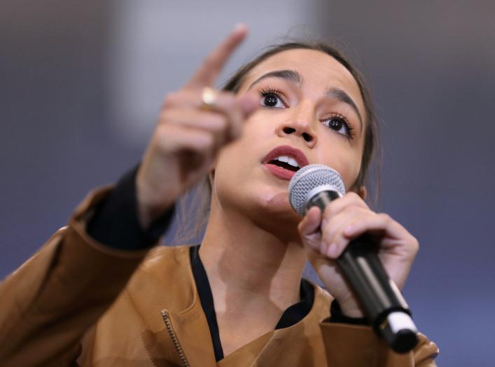 Rep. Alexandria Ocasio-Cortez talks before Democratic 2020 U.S. presidential candidate Senator Bernie Sanders at a rally in Council Bluffs, Iowa, U.S. November 8, 2019. REUTERS/Scott Morgan