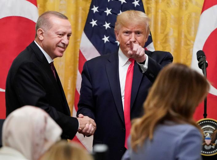 U.S. President Donald Trump greets Turkey's President Tayyip Erdogan after a joint news conference at the White House in Washington, U.S., November 13, 2019. REUTERS/Joshua Roberts