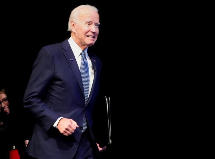 U.S. Democratic presidential candidate and former Vice President Joe Biden runs on stage at a First in the West Event at the Bellagio Hotel in Las Vegas, Nevada, U.S., November 17, 2019. REUTERS/Carlo Allegri