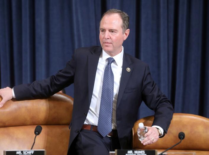 Chairman Adam Schiff (D-CA) returns to his seat following a recess in a House Intelligence Committee hearing as part of the impeachment inquiry into U.S. President Donald Trump on Capitol Hill in Washington, U.S., November 19, 2019. REUTERS/Jonathan Ernst