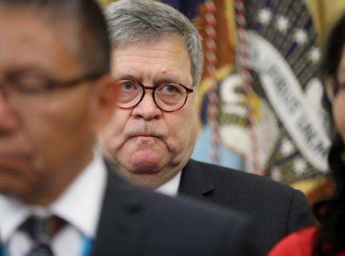 U.S. Attorney General Bill Barr attends as U.S. President Donald Trump signs an Executive Order on Missing and Murdered Native Americans in the Oval Office of the White House in Washington, U.S., November 26, 2019. REUTERS/Jonathan Ernst