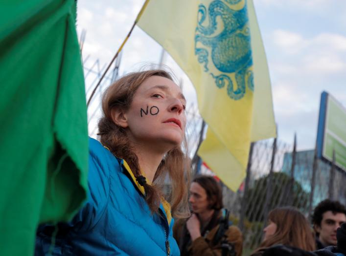 Members of Extinction Rebellion group stage a protest outside the venue of the U.N. climate change conference (COP25), in Madrid, Spain, December 2, 2019. REUTERS/Juan Medina