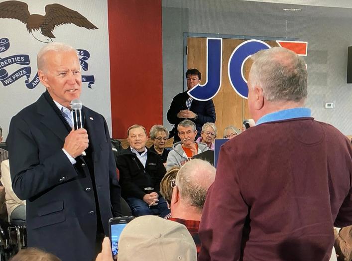 Democratic 2020 U.S. presidential candidate and former U.S. Vice President Joe Biden faces off with a local resident challenging him about his son Hunter Biden's involvement with Ukraine in this screen grab made from video shot during a Biden campaign eve