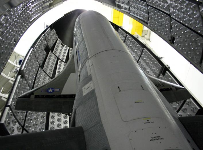 The X-37B Orbital Test Vehicle waits in the encapsulation cell of the Evolved Expendable Launch vehicle at the Astrotech facility in Titusville, Florida in this April,2010 handout photo provided by the U.S. Air Force. The X-37B is the U.S.'s newest and mo