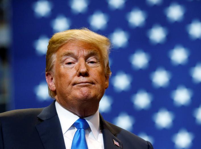 U.S. President Donald Trump pauses during address at campaign rally at Mohegan Sun Arena in Wilkes-Barre, Pennsylvania, U.S., August 2, 2018. REUTERS/Leah Millis