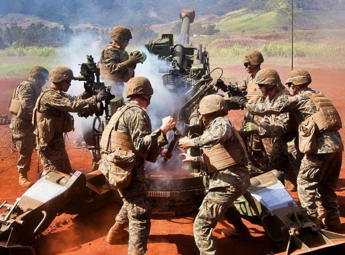 U.S. Marines Firing Artillery