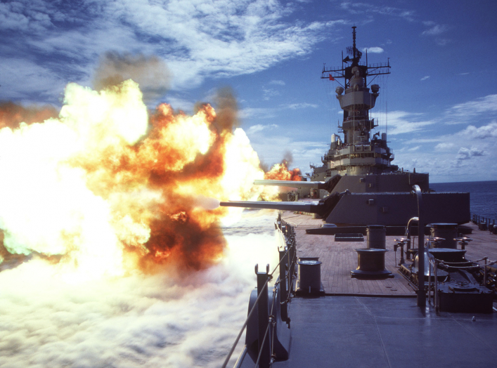  330-CFD-DN-ST-86-02454: The battleship USS Iowa (BB 61) fires a broadside to starboard from its Mk 7 16-inch guns, 7/1/1984. PH1 Jeff Hilton, USN. (OPA-NARA II-2016/01/07).