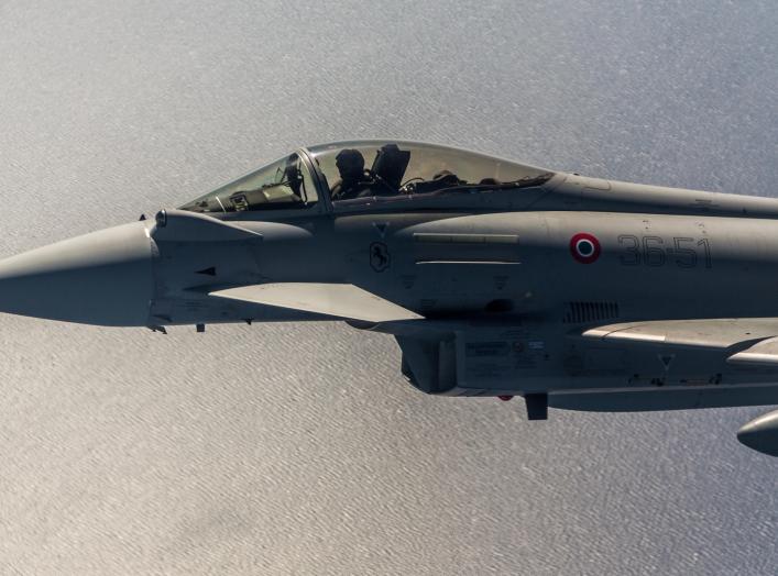 An Italian Eurofighter flies next to a Montenegrin Learjet 45 during a simulated interception exercise. A year on from Montenegro joining the Alliance, NATO has started air policing over the country.