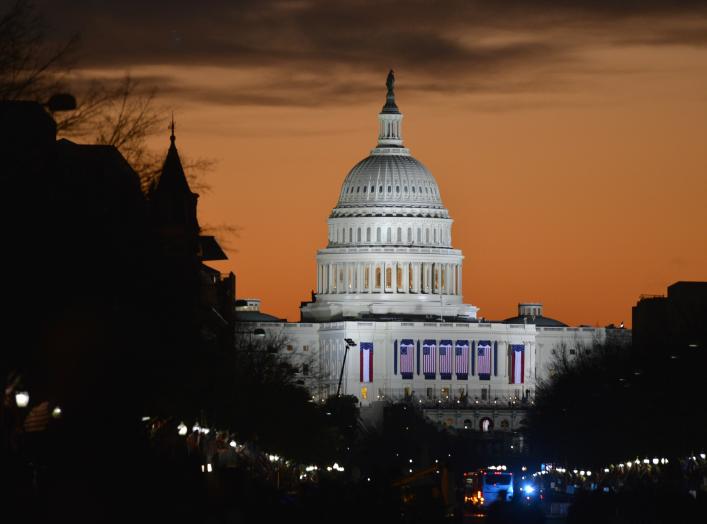 The sun rises over the U.S. Capitol before the public swearing-in ceremony during the 57th Presidential Inauguration in Washington, D.C, Jan. 21, 2013.