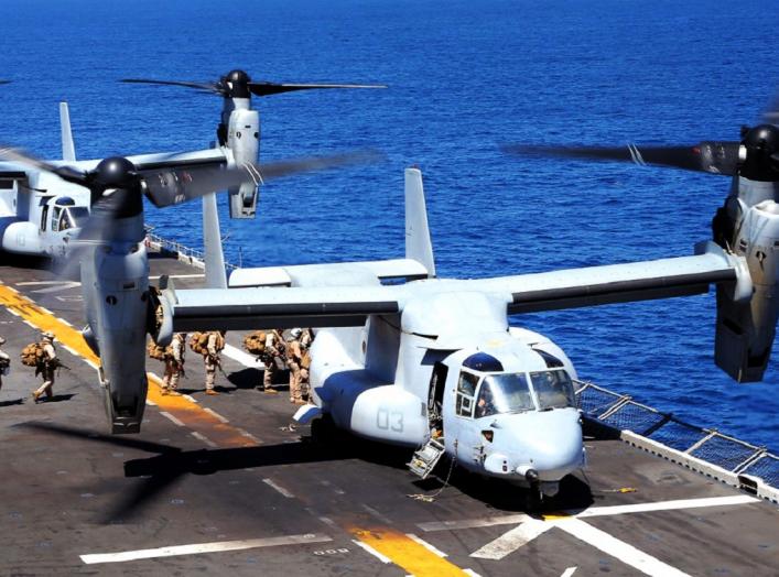 Marines with 1st Battalion, 4th Marine Regiment, 13th Marine Expeditionary Unit, board an MV-22B Osprey during Amphibious Squadron MEU Integration Training June 19, 2013. 