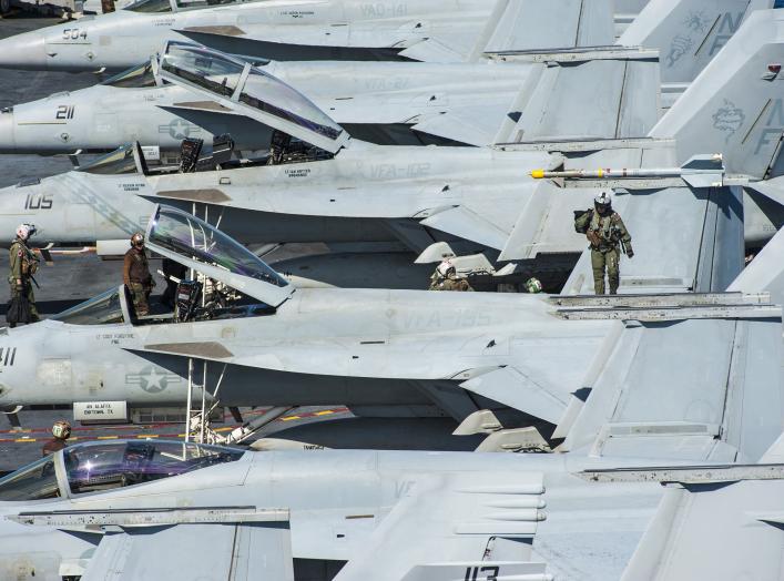 U.S. Sailors prepare for flight operations on the aircraft carrier USS George Washington (CVN 73) in the East China Sea July 28, 2014. 