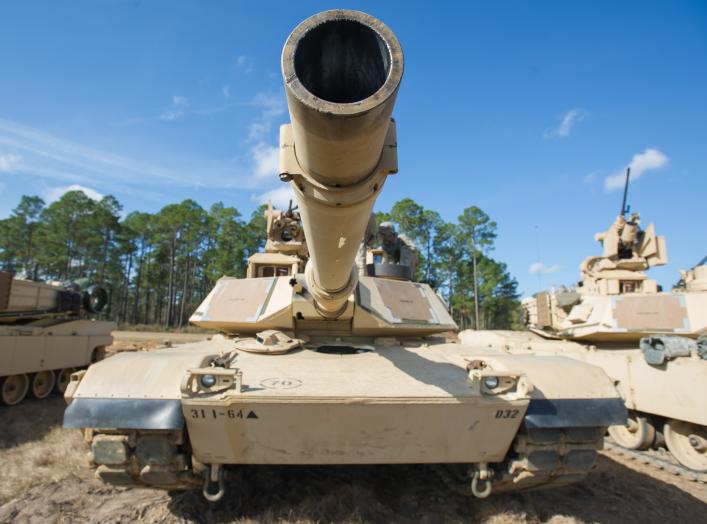 An M1A2SEP Abrams tank from Company D, 1st Battalion, 64th Armor Regiment "Desert Rogues," 2nd Armored Brigade Combat Team, 3rd Infantry Division, sits ready for the days activities here at Red Cloud Range, Dec. 6. 