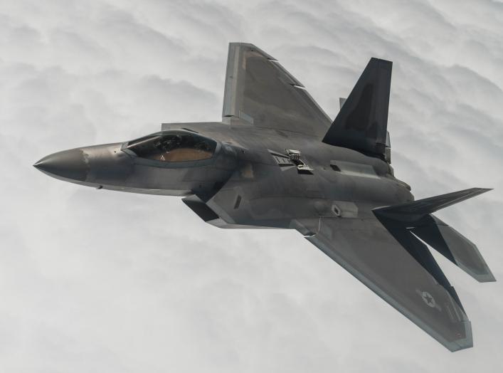  Capt. Chris Batterton aggressively banks his F-22A Raptor during a basic fighting maneuver training mission off the Virginia coast last week. The captain is with the 27th Fighter Squadron, the Air Force's first unit to fly the Raptor. 