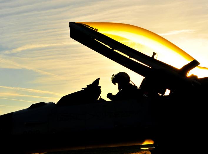 A U.S. Air Force pilot with the 480th Fighter Squadron (FS) performs a preflight functions check on an F-16 Fighting Falcon aircraft before leaving for Nordic Air Meet 2012 at Spangdahlem Air Base, Germany, Aug. 23, 2012.