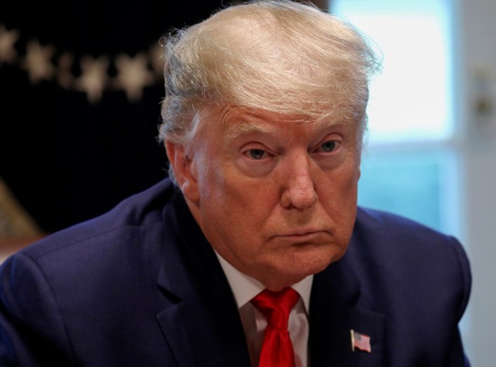 FILE PHOTO: U.S. President Donald Trump hosts a meeting of the coronavirus task force with pharmaceutical executives to discuss developing a coronavirus vaccine in the Cabinet Room of the White House in Washington, U.S., March 2, 2020. REUTERS/Leah Millis