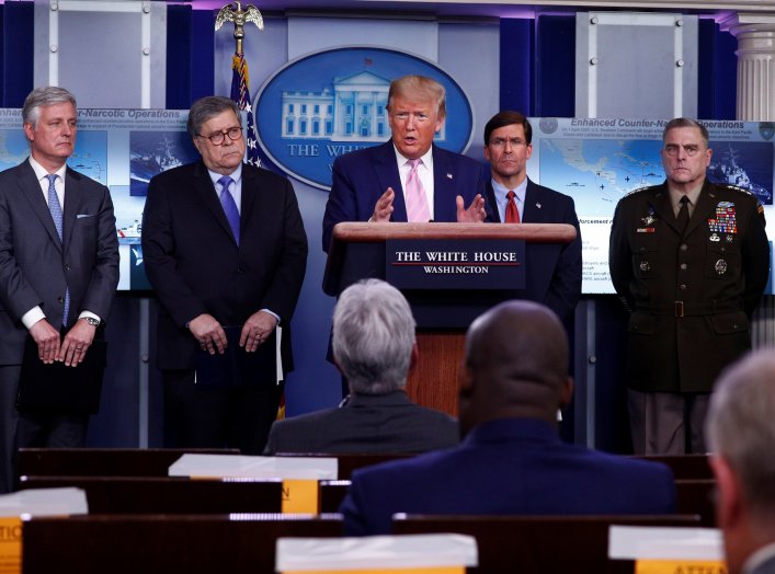 U.S. President Donald Trump addresses the daily coronavirus response briefing as National Security Advisor Robert O'Brien, Attorney General William Barr, Defense Secretary Mark Esper and U.S. Joint Chiefs Chairman Gen. Mark Milley listen at the White Hous