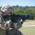 Fort Hood - 1st Lt. Elizabeth Kraft, an Army Reserve Soldier with the 316th Sustainment Command (Expeditionary), based out of Coraopolis, Pa., shoots her M4 carbine at popup targets during qualification at Fort Hood, Tx., Oct. 9, 2016.