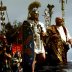 Englishmen from Newcastle, dressed as ancient Romans of the II Augusta Roman Legion, are reflected in a puddle as they march during a parade in Rome April 18, 2004. REUTERS/Max Rossi MR/CRB