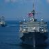 The U.S. Navy Arleigh Burke-class guided-missile destroyer USS Porter and the Blue Ridge-class command and control ship USS Mount Whitney sail in formation during the U.S.-Ukraine multinational maritime exercise Sea Breeze 2018 in the Black Sea July 13, 2