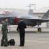 A South Korean fighter pilot (L) stands next to his F-35 stealth fighter during a ceremony to mark the 71st Armed Forces Day at the Air Force Base in Daegu, South Korea, October 1, 2019. Jeon Heon-kyun/Pool via REUTERS