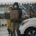 San Diego Food Bank volunteers carry boxes of leftover food after an emergency drive-through food and toilet paper distribution hosted at Southwestern College near the U.S.-Mexico border, amid the coronavirus disease (COVID-19) outbreak in Chula Vista, Ca