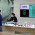 Ashlee Mason, 26, serves a customer at The Pottery Cannabis Dispensary, as marijuana deliveries increase amid the spread of the coronavirus disease (COVID-19), in Los Angeles, California, U.S., April 14, 2020. REUTERS/Lucy Nicholson