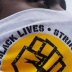 SEIU 32BJ union worker Dalida Rocha takes part in a nationwide Strike for Black Lives, protesting against racial inequality in the aftermath of the death in Minneapolis police custody of George Floyd, in Boston, Massachusetts, U.S., July 20, 2020. REUTERS