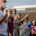 Supporters of the Cherokee County School District's decision to reopen schools to students during the coronavirus disease (COVID-19) pandemic cheer on faculty arriving to the district's headquarters, the Dr. Frank R. Petruzielo Educational Services Facili