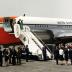 Arrival in Mexico City. President and Mrs. Kennedy debark Air Force One. Mexico City, Mexico, International Airport.