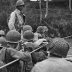 U.S. troops prepare to cross the Voltuma on board a rubber dinghy. Wikimedia.