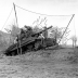 SC 197925. Btry C, 702nd Tank Destroyer Battalion, 2nd Armored Division, tank destroyer on dug-in ramp has plenty of elevation to hurl shells at long range enemy targets across the Roer River. (16 Dec 1944).